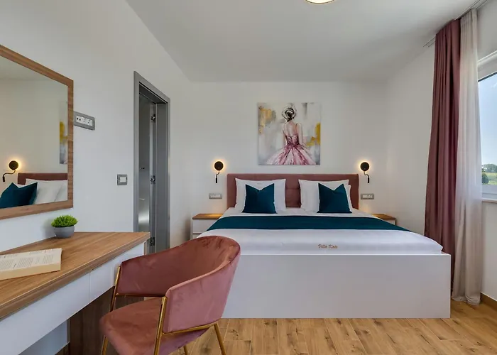 Kate Zadarvillas *